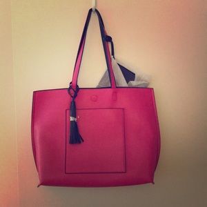 Hot pink tote with wristlet.